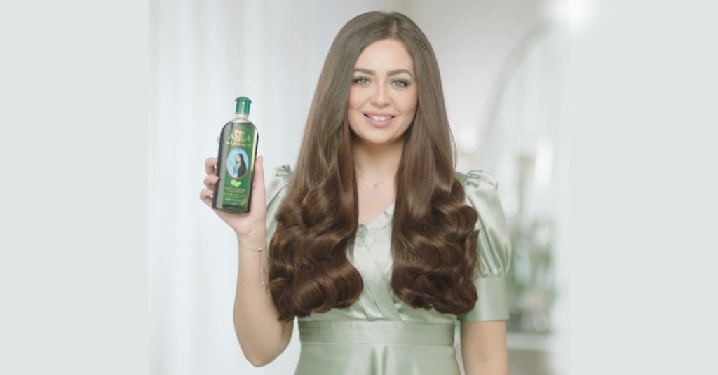 Heba Magdi is the new brand ambassador for Dabur Amla Hair Oil - Black &  White Oman